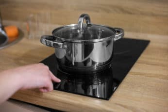 tuching an induction hob while it's turned on