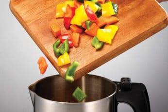 adding vegetables in a soup maker