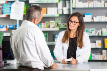 a pharmacist assisting a client