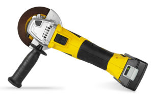 a yellow cordless battery pack powered power tool