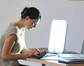 woman having light therapy